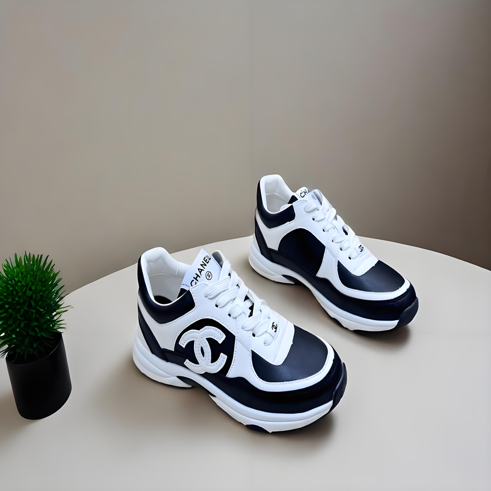 CHANEL White Black CC Sneakers