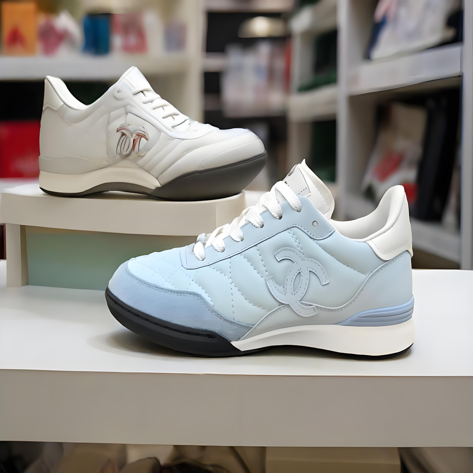 CHANEL White Blue Quilted CC Sneakers