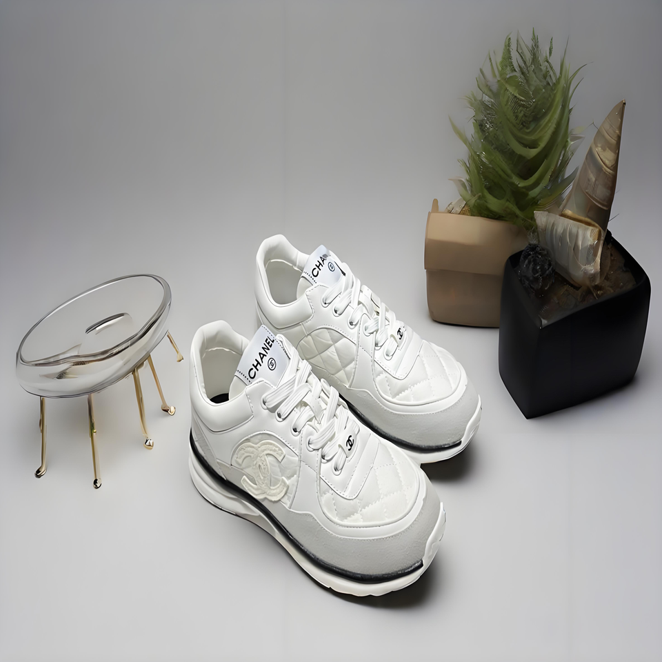 CHANEL White Quilted Leather Sneakers